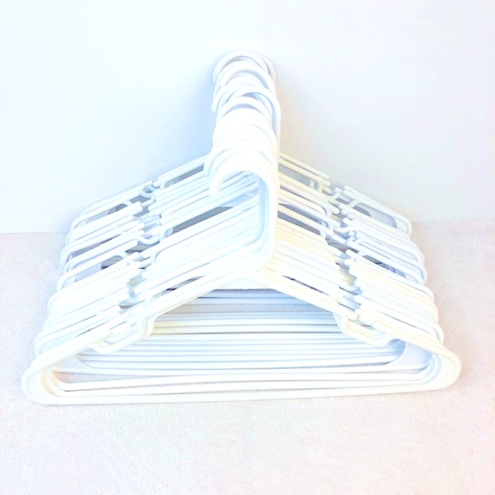 3/$15: (22)Notched Clothes Hangers- white, plastic
